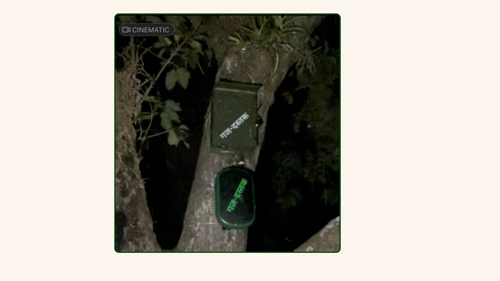 ELEKIND unit mounted on tree at night with Hindi warning signage